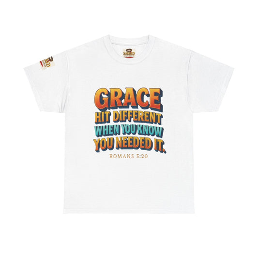 “Covered in Strength” Unisex Tee – Grace Hit Different (Romans 5:20)